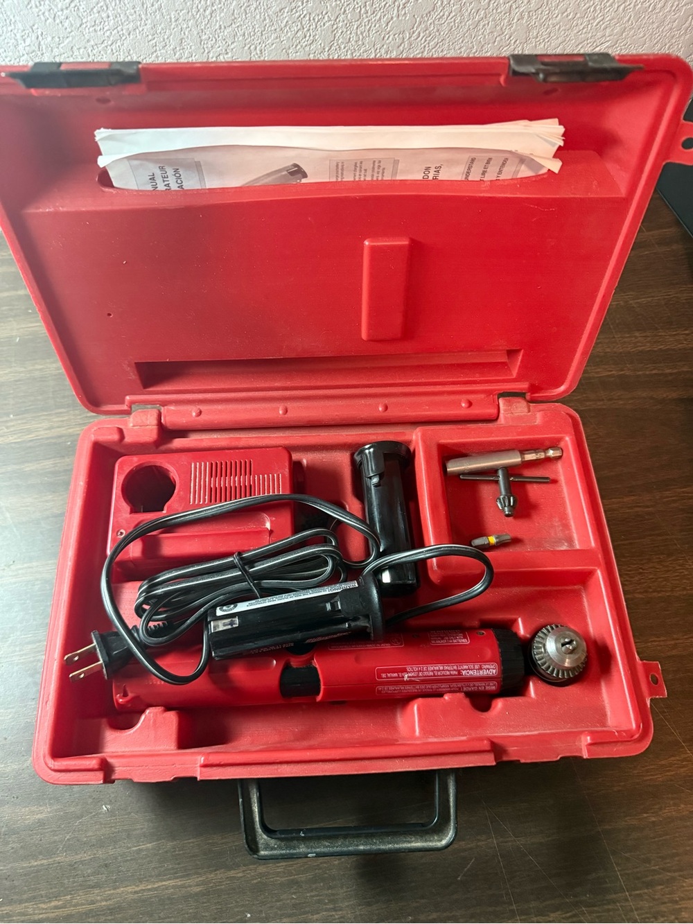 Milwaukee 6546-1 2.4V Cordless Screwdriver with case, charger and accessories.
